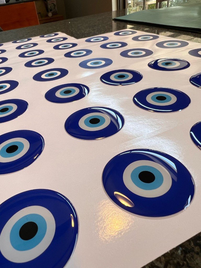 Domed evil eye resin stickers sheet by Plan Photo Repro
