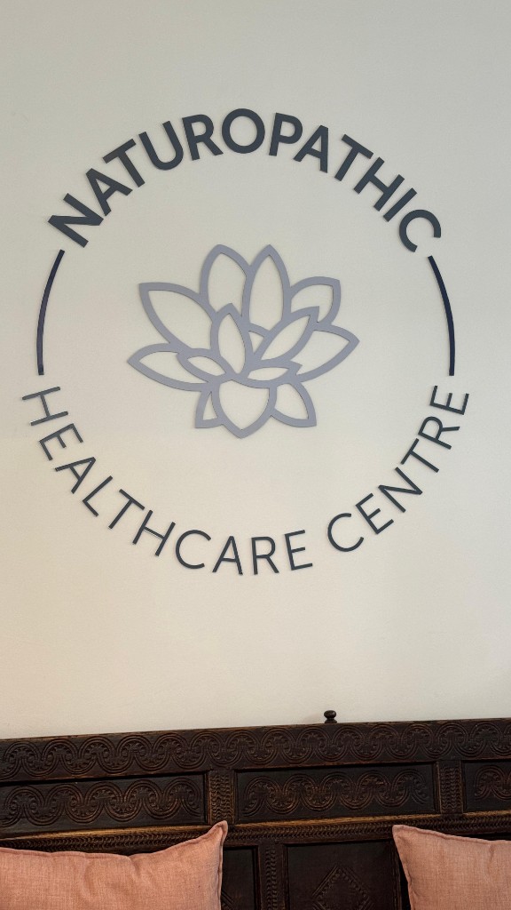 Naturopathic Healthcare Centre 3D logo above reception by Plan Photo Repro
